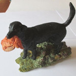 Sherratt and Simpson Black Labrador with Grouse